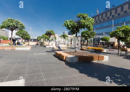 Katowice, Silesia, Poland; September 15, 2019: Katowice main square after renovation with Zenit front wall and people resting on benches Stock Photo