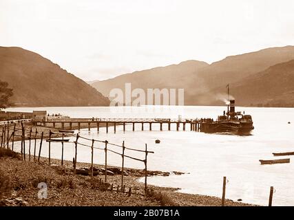 Paddle steamer at Arrochar Pier, Loch Long,, Scotland, Victorian period Stock Photo