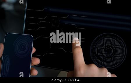 close up hi tech tablet & cell phone with hands.futurist hud display. 4G, 5G technology. Stock Photo