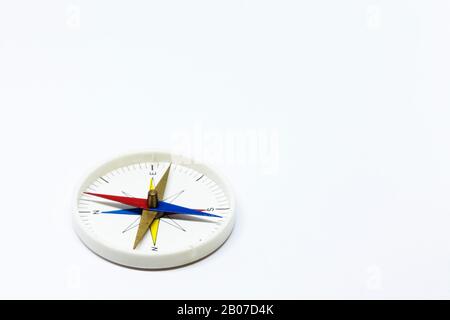 compass with needle on white background studio light Stock Photo