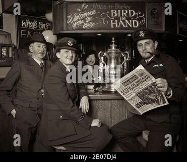 The FA Cup returns to Lovedean, Hampshire having been kept there during WW2 fir safe keeping after being won by Portsmouth FC in 1939. Stock Photo