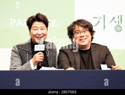 (200219) -- SEOUL, Feb. 19, 2020 (Xinhua) -- Song Kang-ho, a leading actor of South Korean film 'Parasite', speaks beside director Bong Joon-ho at a press conference in Seoul, South Korea, Feb. 19, 2020. 'Parasite', a South Korean black comedy, became the first non-English language film to win the Oscar for best picture, and also nabbed awards for best original screenplay, best international feature film and best director for Bong Joon-ho at the 92nd Academy Awards on Feb. 9, 2020. (Xinhua/Wang Jingqiang) Stock Photo