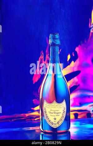 Bottle of Champagne Dom Perignon Vintage 2008 in disco neon lights Stock Photo