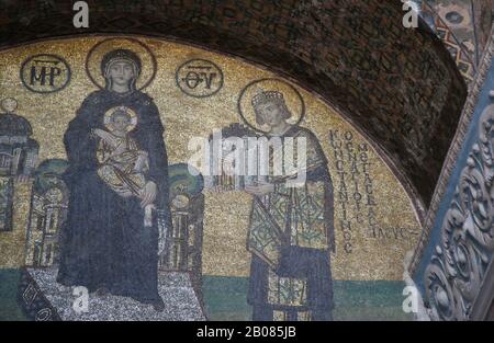 Turkey. Istanbul. Hagia Sofia. Byzatine mosaic. Virgin Mary with Jesus, emperor Constantine the Great. 994. Stock Photo