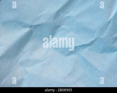 blue crinkled paper texture useful as a background Stock Photo