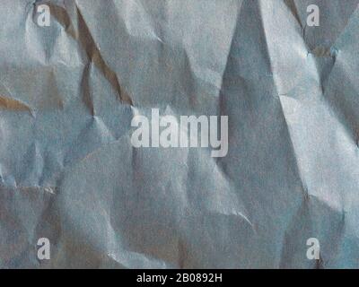 blue crinkled paper texture useful as a background Stock Photo