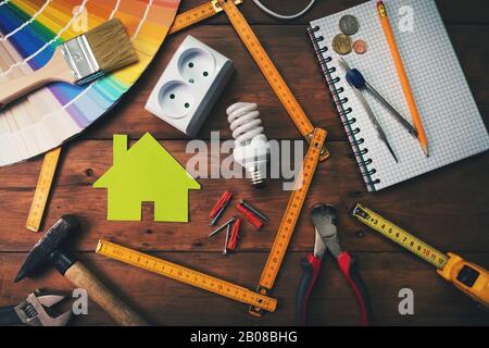 home improvement and repair concept - work tools and objects on wooden table. top view Stock Photo