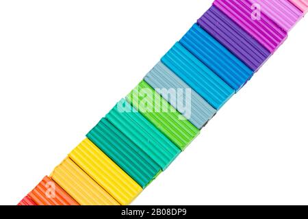 plasticine colorful sticks isolated over white background. creative photo Stock Photo