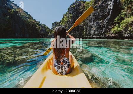 Beautiful woman enjoy the time at the lagoon in Coron, philippines. concept about tropical wanderlust traveling Stock Photo