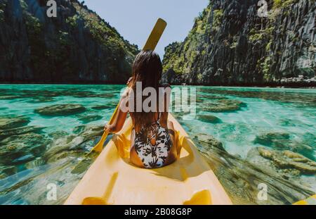 Beautiful woman enjoy the time at the lagoon in Coron, philippines. concept about tropical wanderlust traveling Stock Photo