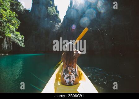 Beautiful woman enjoy the time at the lagoon in Coron, philippines. concept about tropical wanderlust traveling Stock Photo