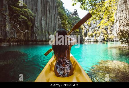 Beautiful woman enjoy the time at the lagoon in Coron, philippines. concept about tropical wanderlust traveling Stock Photo