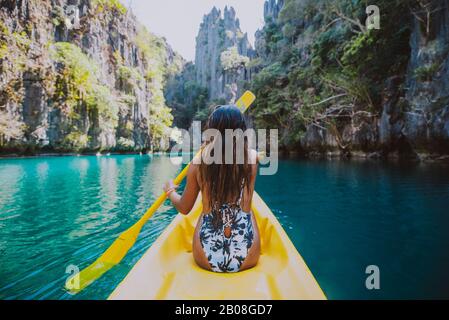 Beautiful woman enjoy the time at the lagoon in Coron, philippines. concept about tropical wanderlust traveling Stock Photo