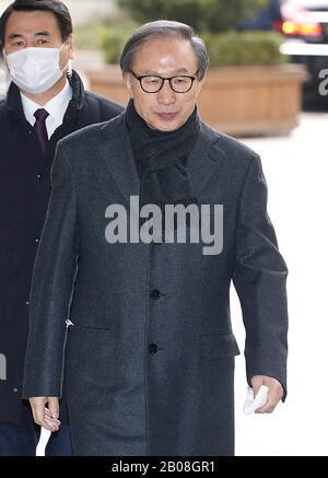 (200219) -- SEOUL, Feb. 19, 2020 (Xinhua) -- Former South Korean President Lee Myung-bak (front) arrives at the Seoul High Court in Seoul, South Korea, Feb. 19, 2020. A South Korean appellate court on Wednesday sentenced former President Lee Myung-bak to 17 years in jail over a set of corruptions, including bribery and embezzlement.    The Seoul High Court handed down the ruling on Lee, who served as the country's head of state for five years from early 2008, fining him 13 billion won (10.9 million U.S. dollars). (NEWSIS/Handout via Xinhua) Stock Photo