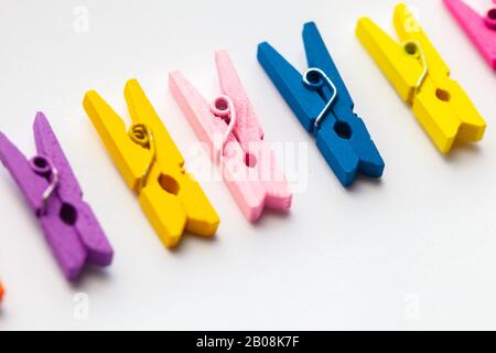 Small Clothespins of different colors close-up as a texture and background  in full screen. 17072530 Stock Photo at Vecteezy