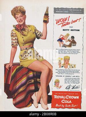 BETTY HUTTON (1921-2007) American stage and film actress and dancer promoting her 1944 film The Miracle of Morgan's Creek along with Royal Crown Cola Stock Photo