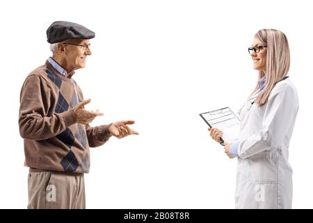 Senior man talking to a young female doctor isolated on white background Stock Photo