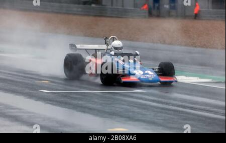 Peter Brennan driving his 1972, Blue and Orange, Brabham BT40, in the wet, during the HSCC Historic Formula 2 Race, at the 2019 Silverstone Classic Stock Photo