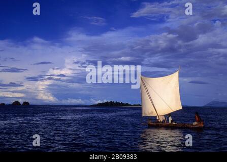 MADAGASCAR, NOSY KOMBA, LOCAL OUTRIGGER SAILING CANOE Stock Photo