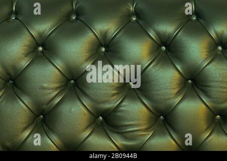 Green leather material furniture upholstery pattern background Stock Photo