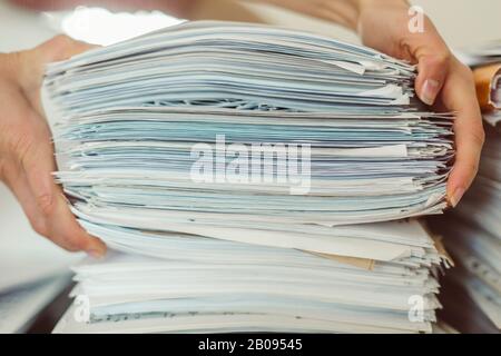 Stack of reporting paper documents. Stock Photo