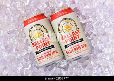IRVINE, CALFORNIA - FEBRUARY 17, 2019: Two cnas of Ballast Point Grapefruit Sculpin IPA, on a bed of ice. Stock Photo