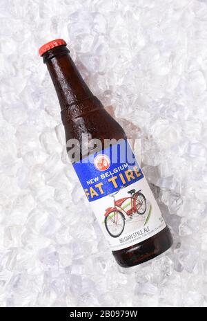 IRVINE, CALIFORNIA - OCTOBER 30, 2017: Fat Tire Amber Ale on ice. A bottle of Fat Tire Amber Ale from the New Belgium Brewing Company, of Fort Collins Stock Photo