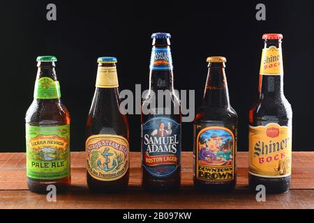 IRVINE, CA - JUNE 18, 2015: A variety of popular domestic beer brands. Five brands including, Samuel Adams, Anchor Steam, Sierra Nevada, Downtown Brow Stock Photo
