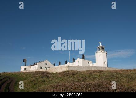 Early Morning View of Lizard Point Lighthouse on the South West Coast Path in Rural Cornwall, England, UK Stock Photo