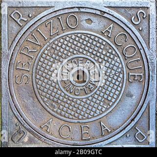 SPQR manhole cover in Rome on a summer day Stock Photo - Alamy