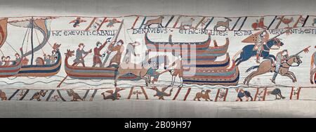 Bayeux Tapestry scene 39:  Horses are disembarked in England from Duke Williams invasion fleet. Stock Photo