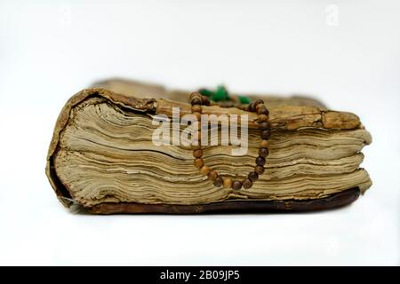 Antique old books isolated on white background. Selective focus. Stock Photo