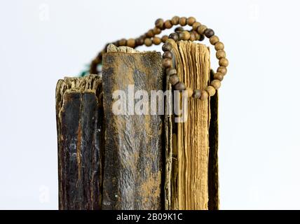 Antique old books isolated on white background. Selective focus. Stock Photo