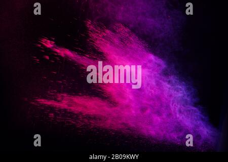 Abstract color splash for wallpaper design. Colorful dust explode. Paint splash on white background Stock Photo