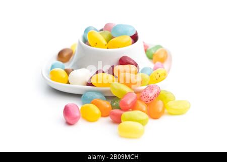 Fruity jellybeans. Tasty colorful jelly beans isolated on white background. Stock Photo