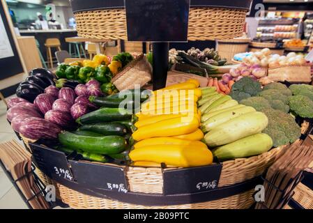 Vegetable basket arranged by type and colour Stock Photo