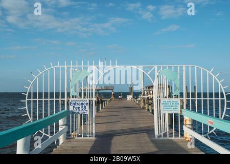 PINE ISLAND, FLORIDA - JAN 17, 2020. Entrance fee gate of Bokeelia Fishing Pier on the north side of the island. Stock Photo