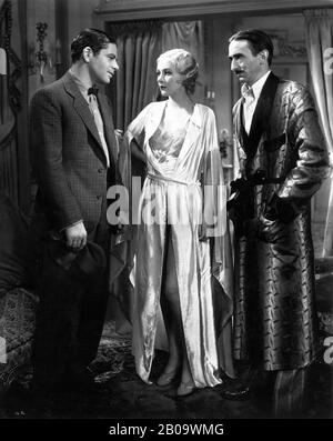 PAUL MUNI as Tony Camonte KAREN MORLEY and OSGOOD PERKINS in SCARFACE 1932 directors HOWARD HAWKS and RICHARD ROSSON novel Armitage Trail screen story Ben Hecht producer Howard Hughes The Caddo Company / United Artists Stock Photo