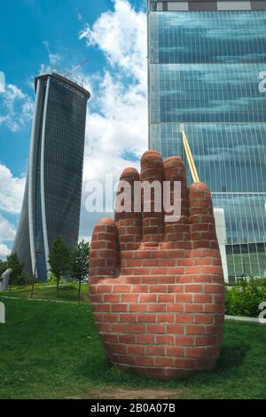 Milan / Italy - June 23 2019: 'The Hand' from 'Hand and Foot for Milan' artwork by Judith Hopf, at City Life District in Milan. Stock Photo