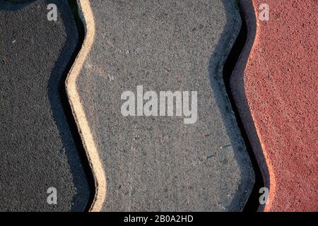 Black, grey and red bricks Stock Photo