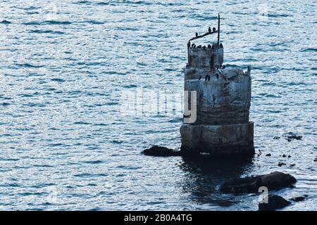 Weathered Coastal Landmark Beacon Structure Stock Photo