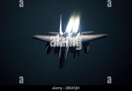 A U.S. Air Force F-15E Strike Eagle fighter jet, breaks away from refueling during a mission supporting Operation Inherent Resolve July 18, 2019 over Syria. Stock Photo