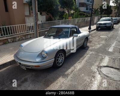 Silver car Alfa Romeo Spider Veloce, amazing cabriolet park in old town of Palma de Mallorca, Spain 29th of January 2020 Stock Photo