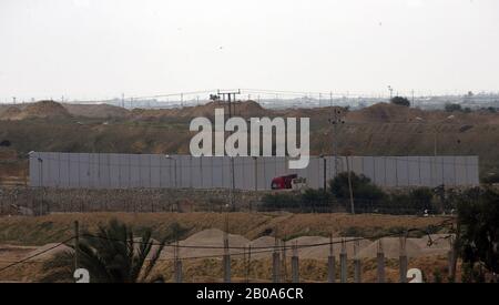 A picture taken in Rafah in the southern Gaza Strip at the border with Egypt shows a concrete wall under construction on the Egyptian side of the border on Wednesday, on February 19, 2020. Egypt has begun building a concrete wall along its border with Gaza, security source said. the Rafah crossing with Egypt, the only gateway out of Gaza that does not lead into Israel. The wall is being built along the lines of an old, lower barrier that includes an underground structure designed to curb smuggling tunnels between Gaza and Egypt. Photo by Ismael Mohamad/UPI Stock Photo