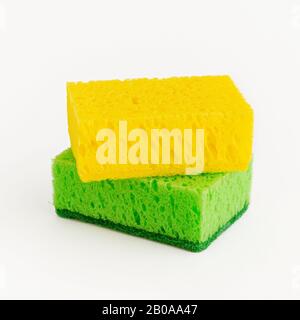 Two sponges isolated on white. House and kitchen cleaning concept. Stock Photo