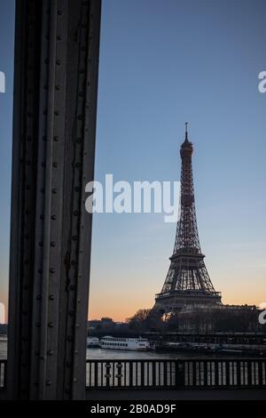 Sunset on the Eiffel Tower seen from the Pont de Bir Hakim in Paris.