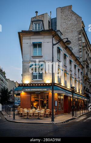 A French bistro and cafÃ© on a street corner in Passy, Paris, France. Stock Photo