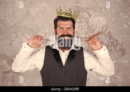 Welcome to my barbershop. Bearded man work in barbershop. Hipster hold barber tools on abstract background. Barbershop concept. Hair shaping and styling. Big boss luxury barbershop. Stock Photo