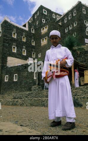 SAUDI ARABIA, NEAR ABHA, WADI AL AWS, RIJAL ALMA MUSEUM, LOCAL BOY Stock Photo