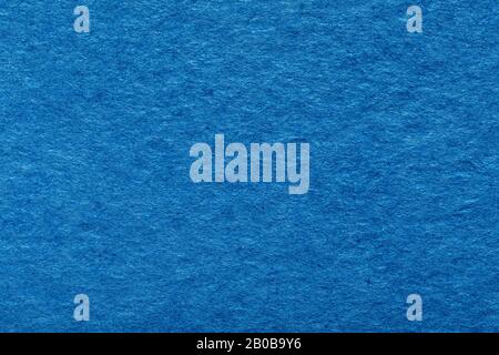 Blank rough surface macro view. Blue paper texture background. Stock Photo